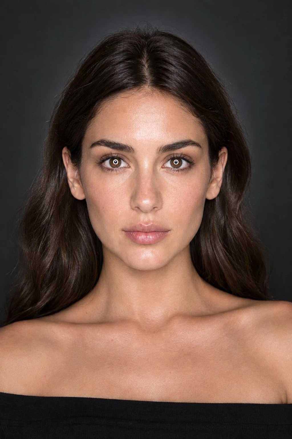 Bring the ring closer on axis — doughnut catchlights grow larger in both eyes, with a stronger on-axis glow on forehead… Same woman on charcoal with larger round ring catchlights in both eyes and a stronger on-axis glow on forehead and cheeks.