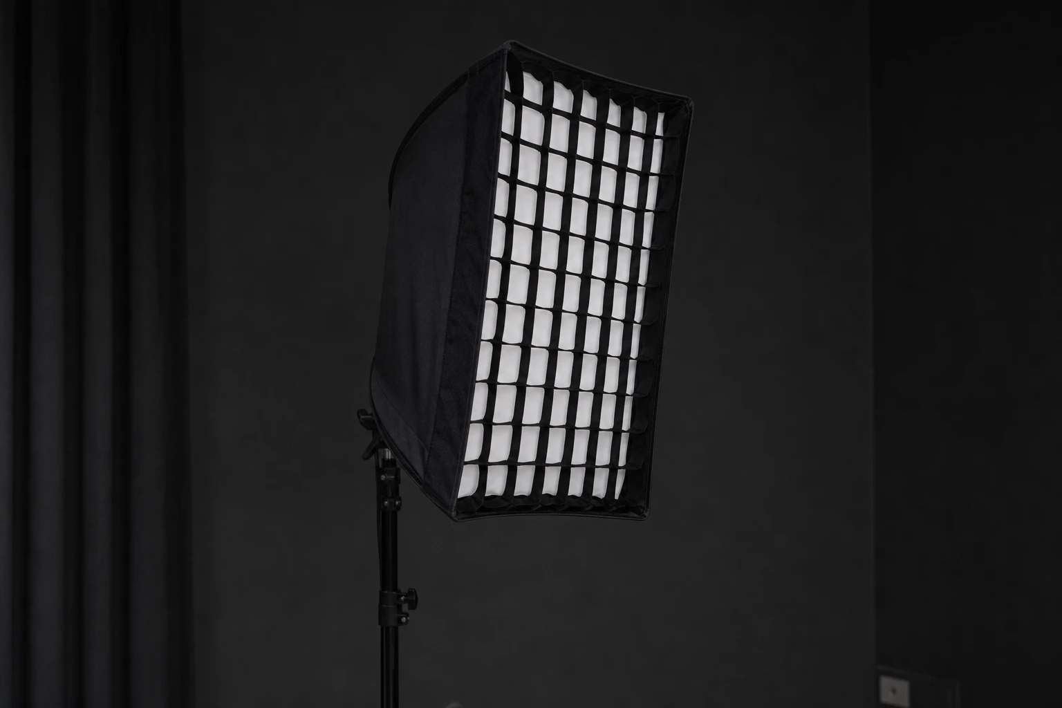 Grid, rigged as it is used — Honeycomb grids snap onto softboxes and strips to kill spill while keeping the modifier’s soft character on-axis